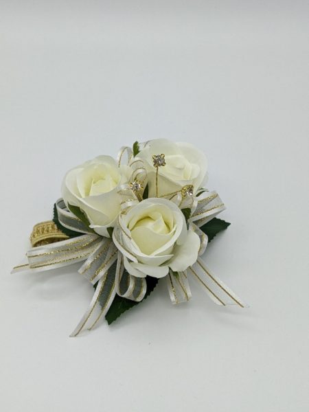 white roses with a spray of gold diamante