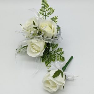 white roses with green ferns