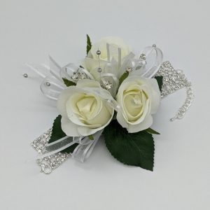 white roses on an adjustable diamante