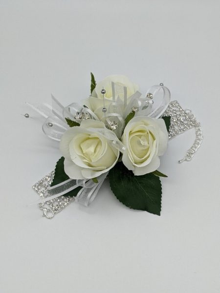white roses on an adjustable diamante